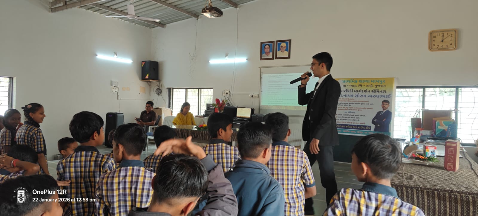 Dr. Naik delivering a seminar with students